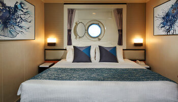 1548636728.812_c356_Norwegian Cruise Lines Norwegian Jade Accommodation MidShip Oceanview Porthole.jpg